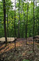 Emplacement pour tente situé à flanc de montagne