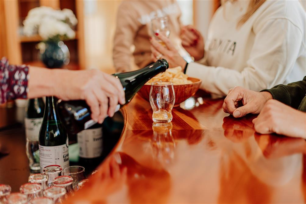 Pouring a drink (&copy;Domaine Heritage)